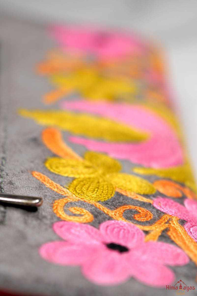 Everyday purse with beautiful handmade cashmere embroidery, lots of detailing and plenty of interior space make this wallet a must have . 