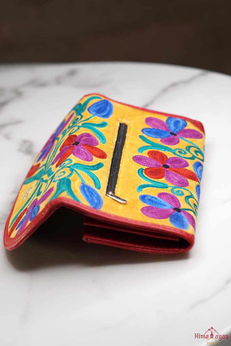 This stunning piece of handcrafted wallet is specially designed with Kashmiri style hand-embroidery. Perfect for everyday use, you can organize your money and cards perfectly in this wallet.