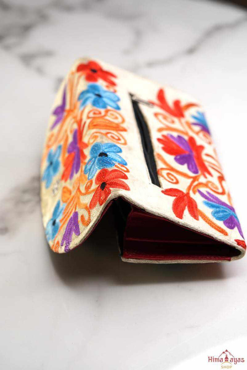 This stunning piece of handcrafted wallet is specially designed with Kashmiri style hand-embroidery. Perfect for everyday use, you can organize your money and cards perfectly in this wallet.