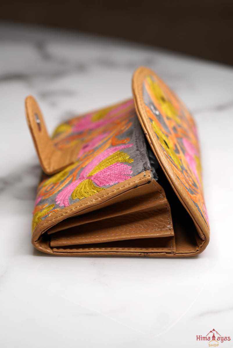 This stunning piece of handcrafted wallet is specially designed with Kashmiri style hand-embroidery, perfect for everyday use,