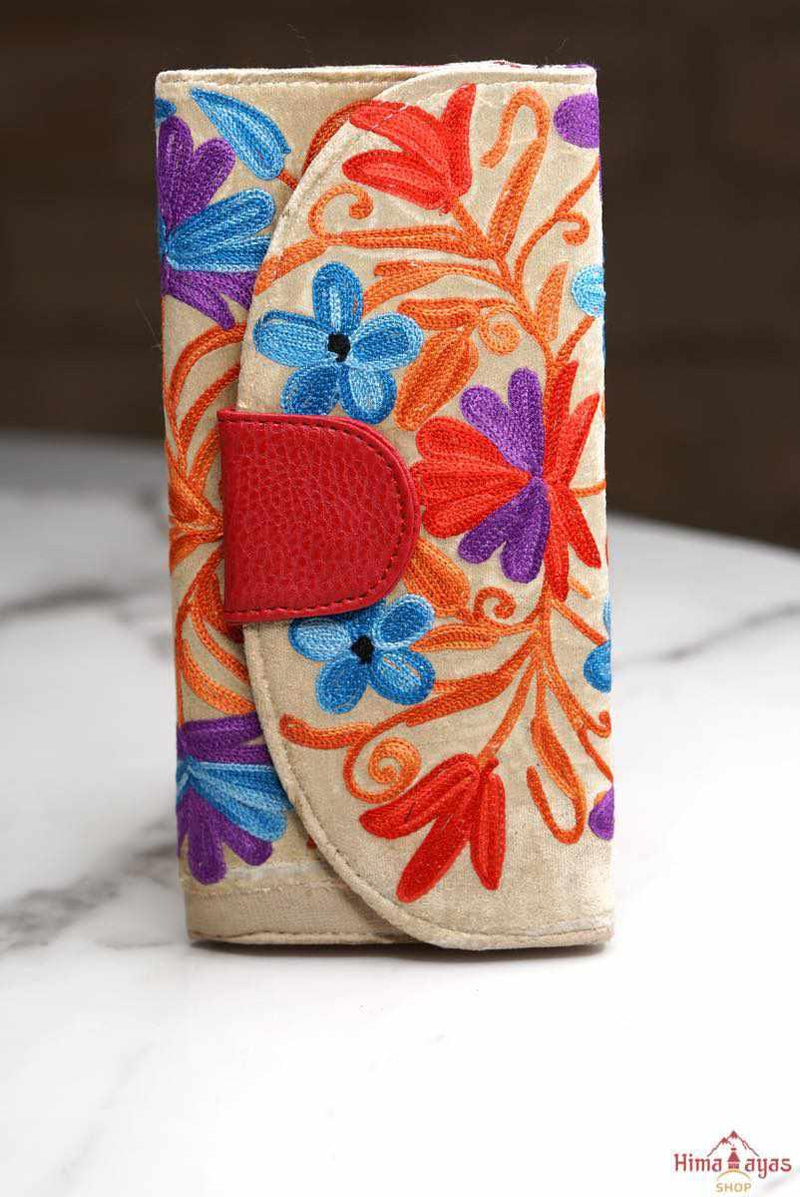 A lightweight everyday wallet, perfect size for your essentials, crafted from beautiful hand-embroidery design on a suede leather.