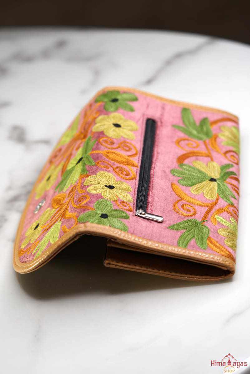 A lightweight everyday wallet, perfect size for your essentials, crafted from beautiful hand-embroidery design on a suede leather.