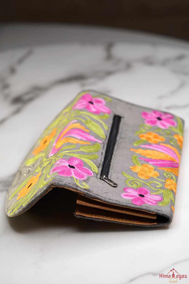 A stunning piece of handcrafted wallet specially designed with Kashmiri style hand-embroidery. Perfect for everyday use, you can organise your money and cards perfectly in this wallet.