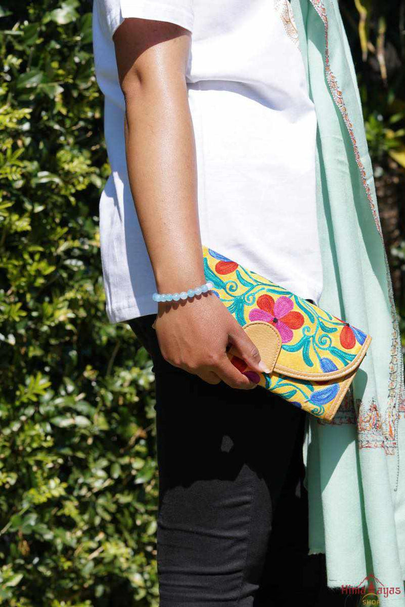  This stunning piece of handcrafted wallet is specially designed with Kashmiri style hand-embroidery. Perfect for everyday use, you can organize your money and cards perfectly in this wallet.