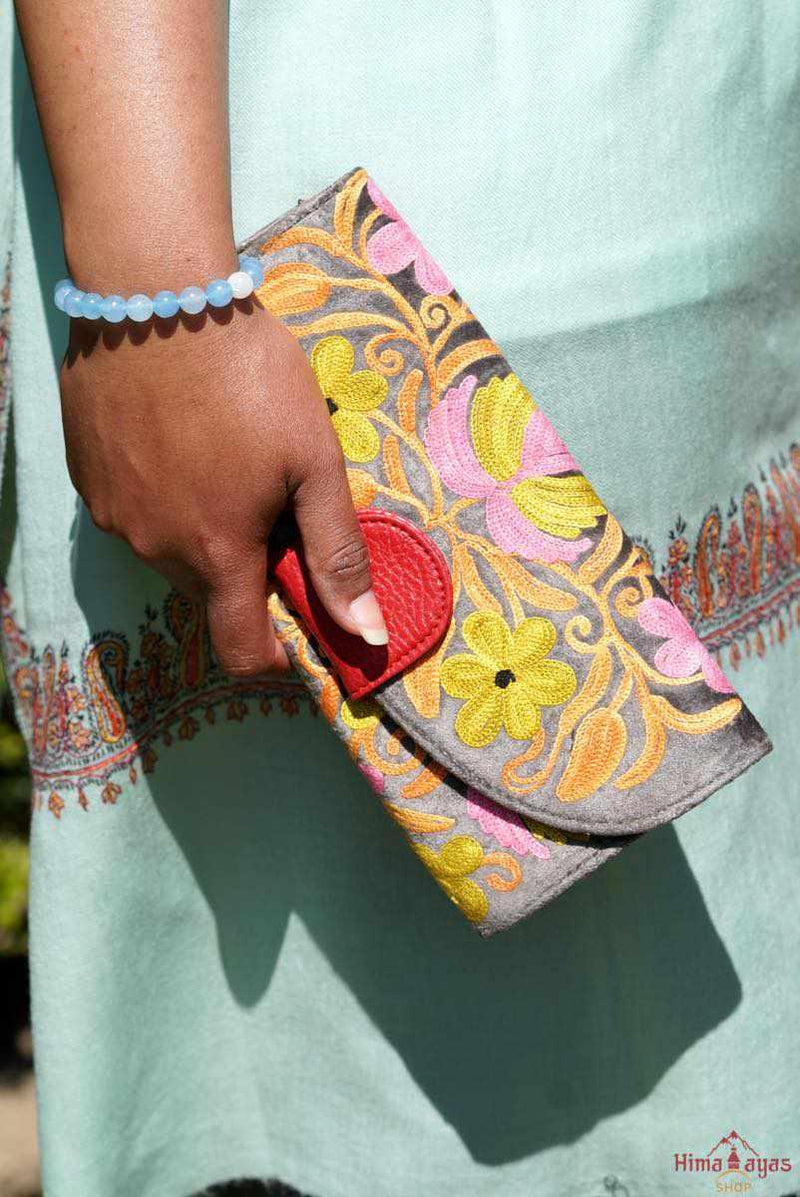 Everyday purse with beautiful handmade cashmere embroidery, lots of detailing and plenty of interior space make this wallet a must have . 