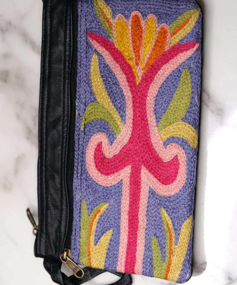 A stylish and ethically made wristlet purse to carry all your everyday essentials. 
