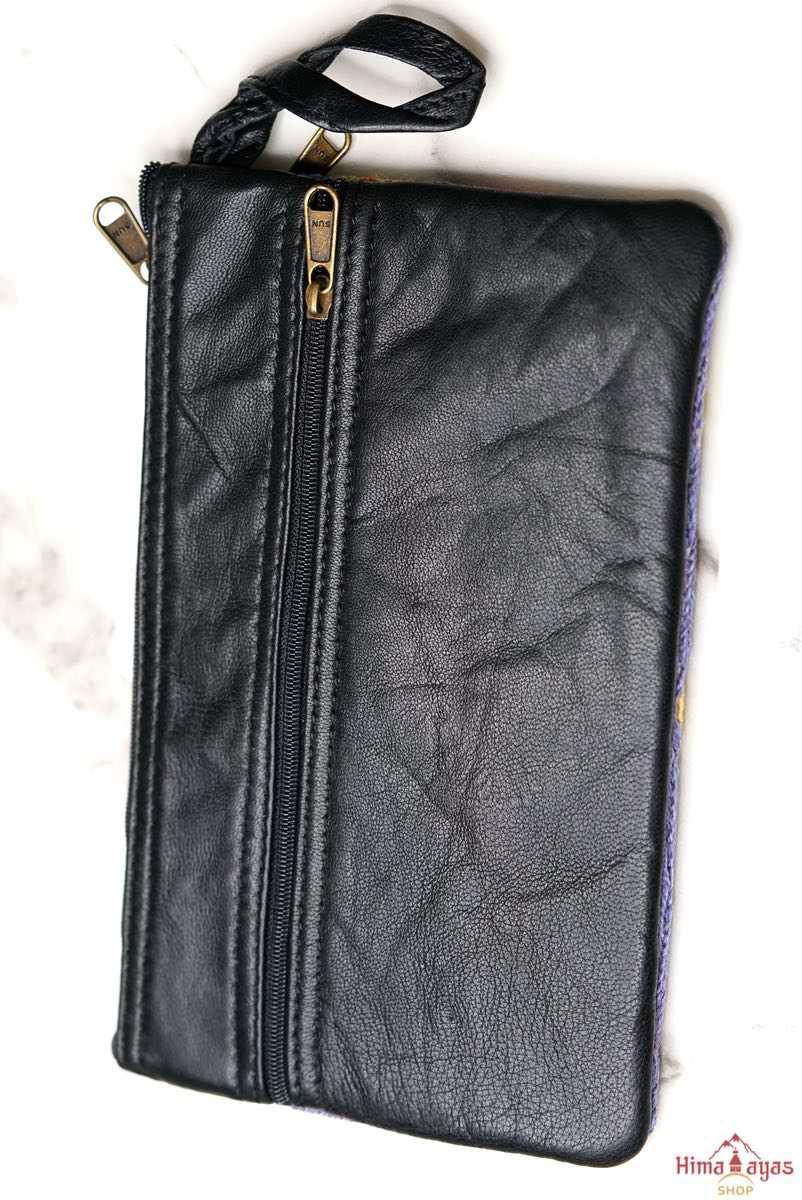 A stylish and ethically made wristlet purse to carry all your everyday essentials. 