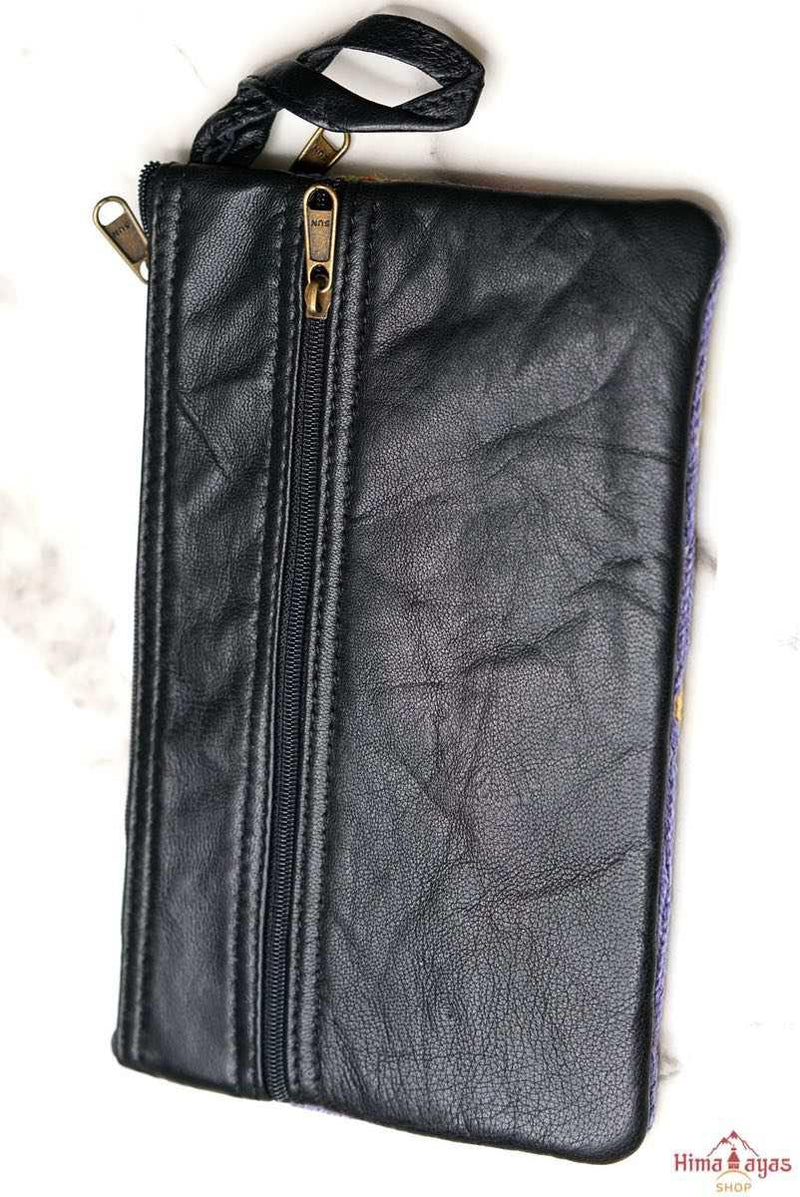 A stylish and ethically made wristlet purse to carry all your everyday essentials. 