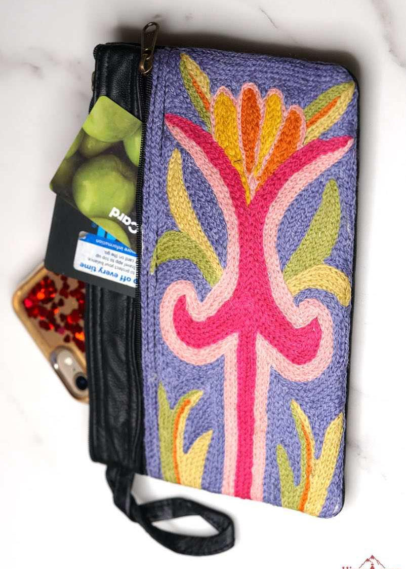 A stylish and ethically made wristlet purse to carry all your everyday essentials. 