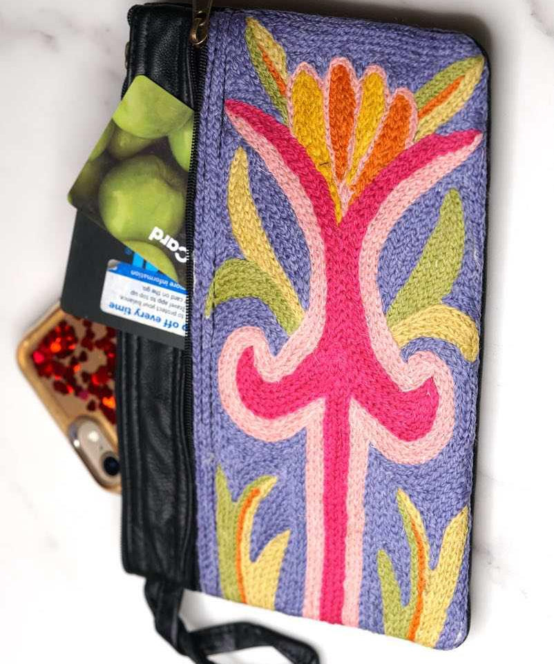 A stylish and ethically made wristlet purse to carry all your everyday essentials. 