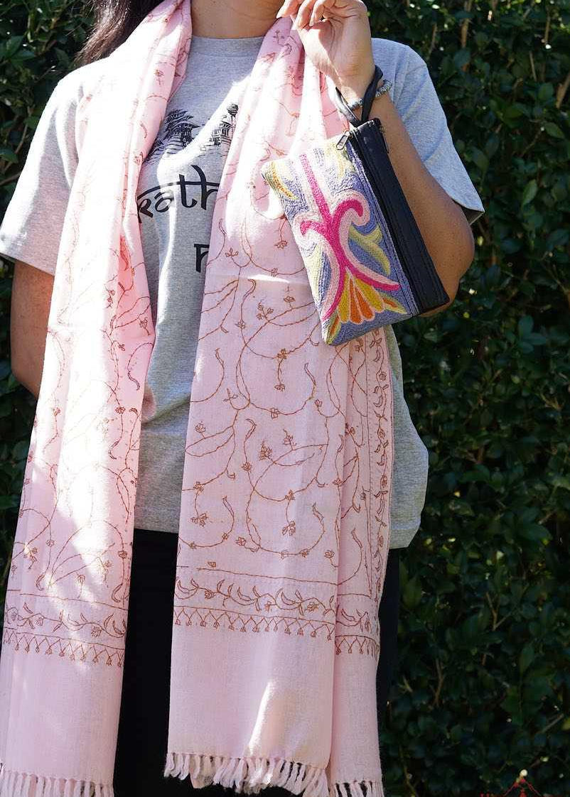 A stylish and ethically made wristlet purse to carry all your everyday essentials. 