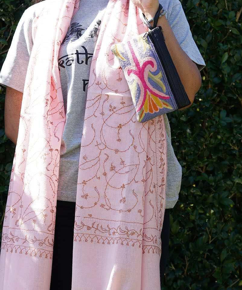 A stylish and ethically made wristlet purse to carry all your everyday essentials. 