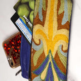A stylish and ethically made wristlet purse to carry all your everyday essentials. 