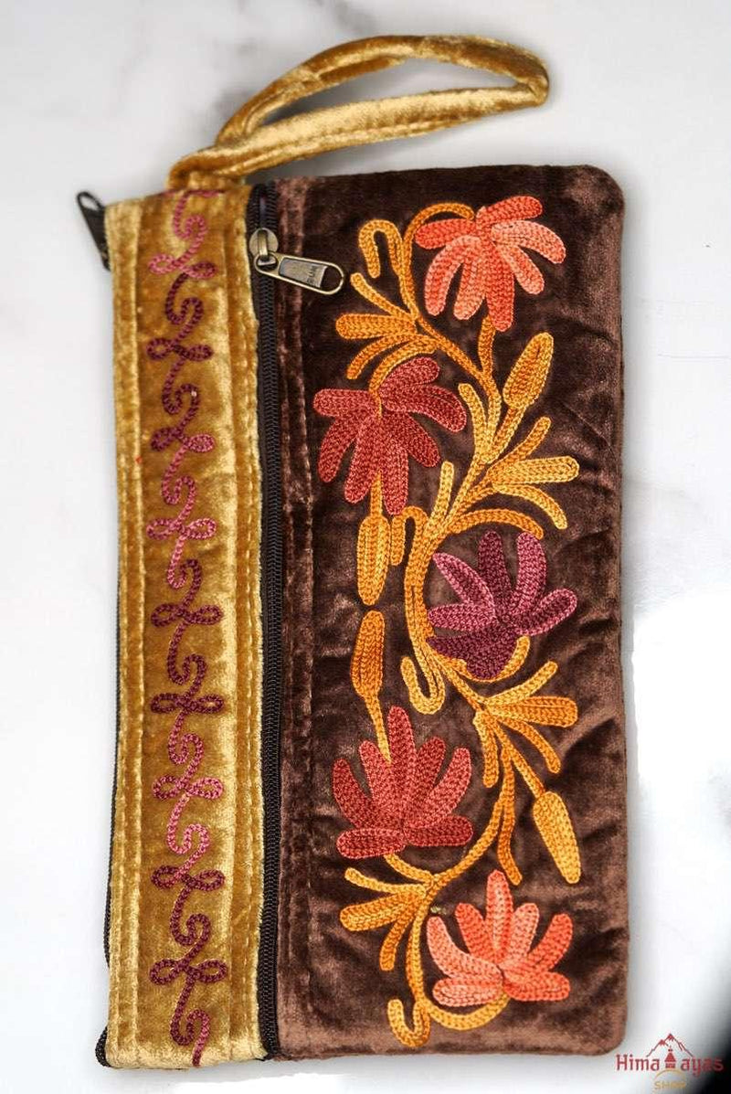 A unique style women's wristlet wallet with floral pattern, crafted ethically from Himalayas.