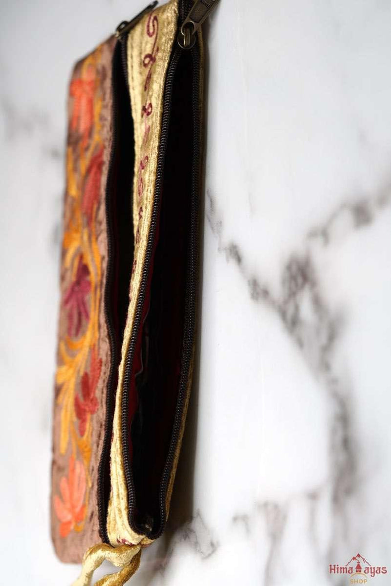 A unique style women's wristlet wallet with floral pattern, crafted ethically from Himalayas.
