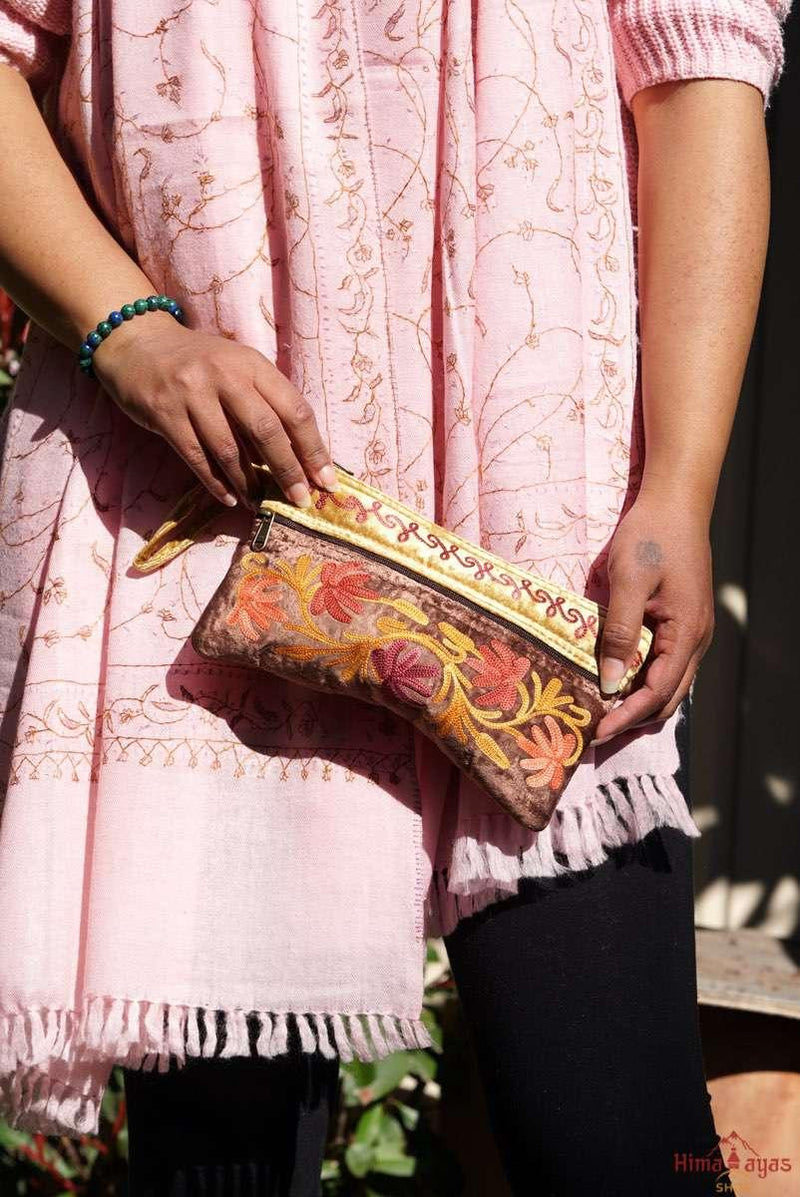 A unique style women's wristlet wallet with floral pattern, crafted ethically from Himalayas.