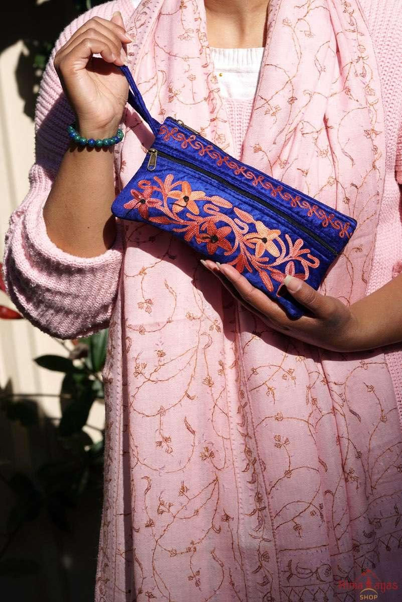 A unique style women's wristlet wallet with floral pattern, crafted ethically from Himalayas.