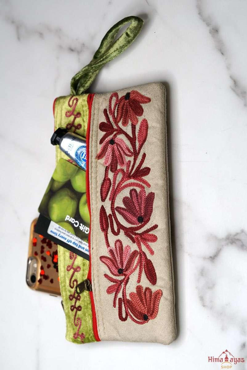 A fashionable wristlet women purse for everyday use, handmade with kashmiri embroidery design for chic style. 