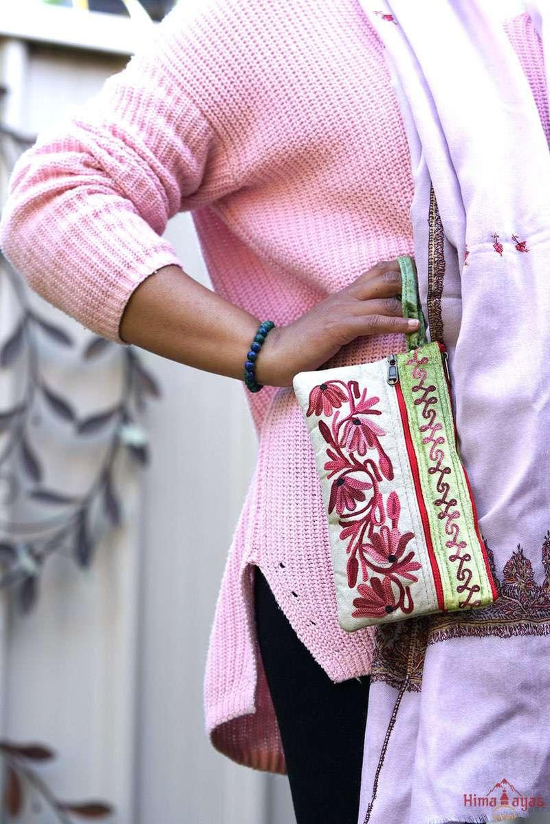 A fashionable wristlet women purse for everyday use, handmade with kashmiri embroidery design for chic style. 