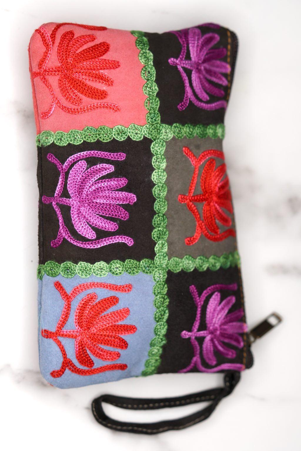 A stylist wristlet women purse for everyday use, handmade and kashmiri embroidery design for boho style. 