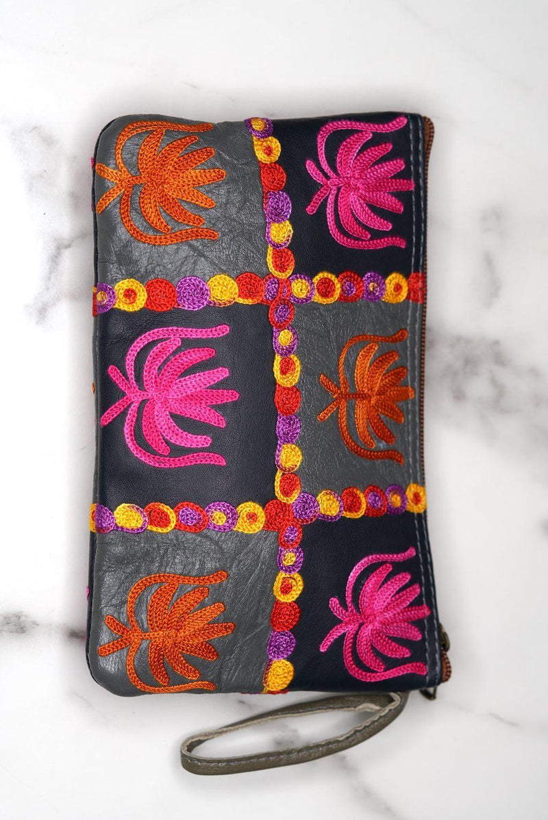 A stylist wristlet women purse for everyday use, handmade and kashmiri embroidery design for boho style. 