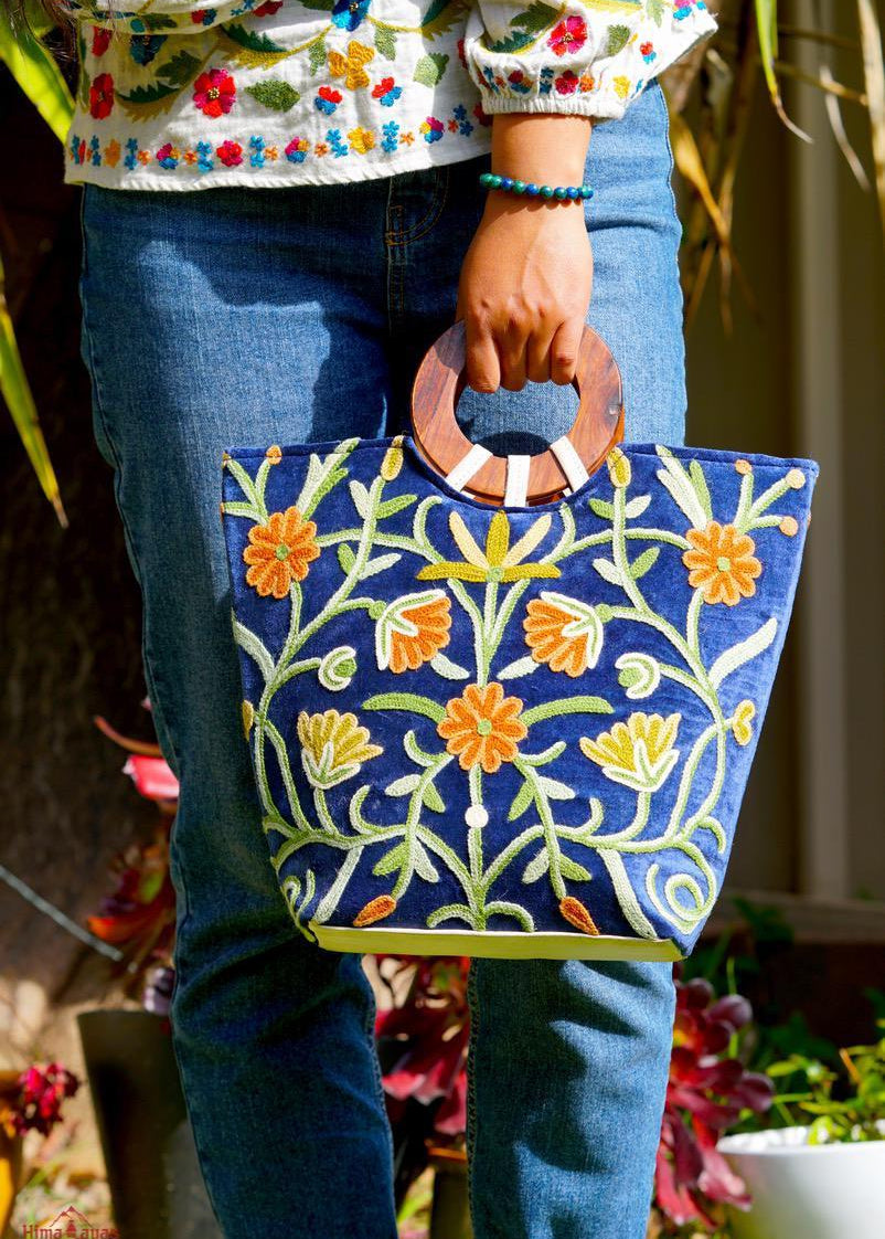 A classic women's tote bag, crafted with beautiful cashmere floral embroidery to give it a chic stylish look.