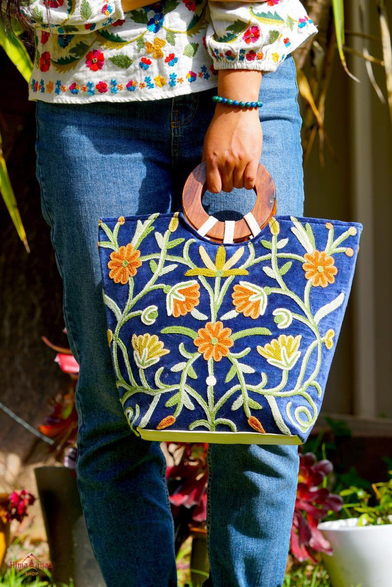 A classic women's tote bag, crafted with beautiful cashmere floral embroidery to give it a chic stylish look.
