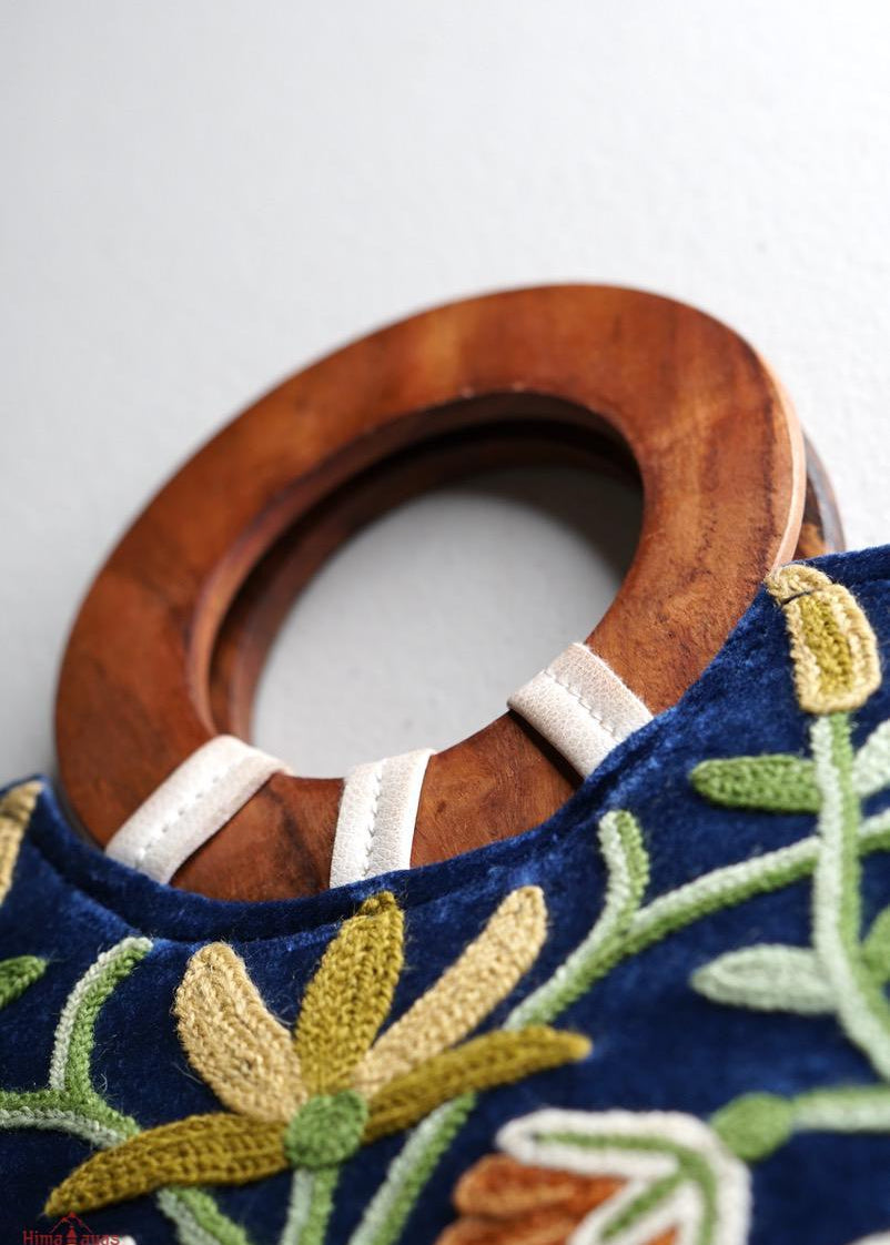 A classic women's tote bag, crafted with beautiful cashmere floral embroidery to give it a chic stylish look.