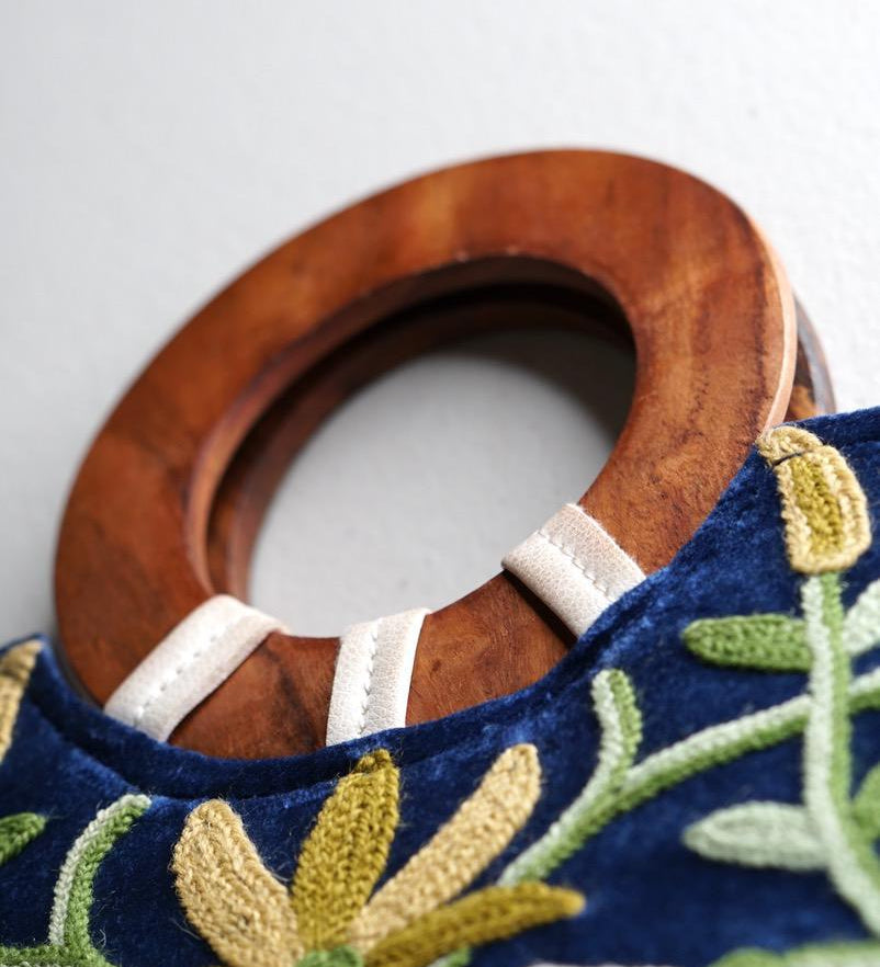 A classic women's tote bag, crafted with beautiful cashmere floral embroidery to give it a chic stylish look.