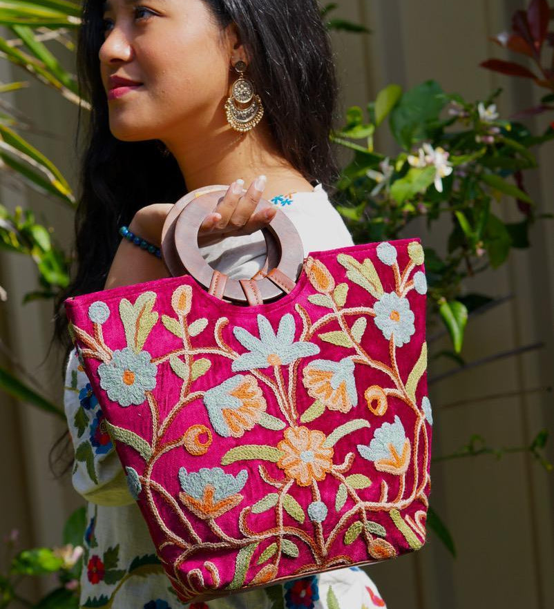 A classic women's tote bag, crafted with beautiful cashmere floral embroidery to give it a chic stylish look.