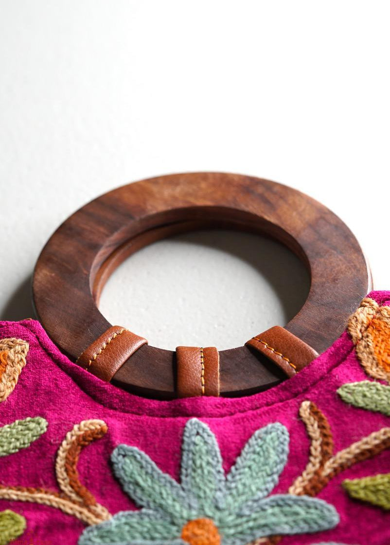 A classic women's tote bag, crafted with beautiful cashmere floral embroidery to give it a chic stylish look.