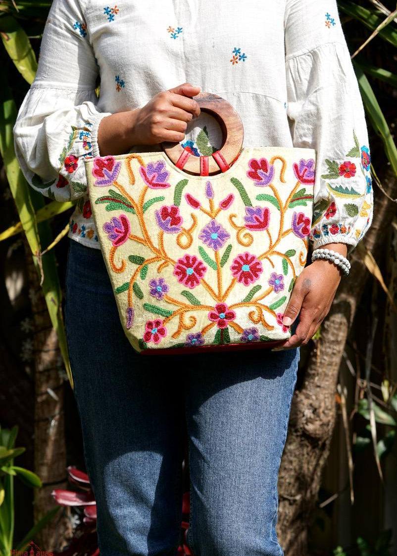 A stylish women's tote bag with floral pattern, crafted ethically from Himalayas.