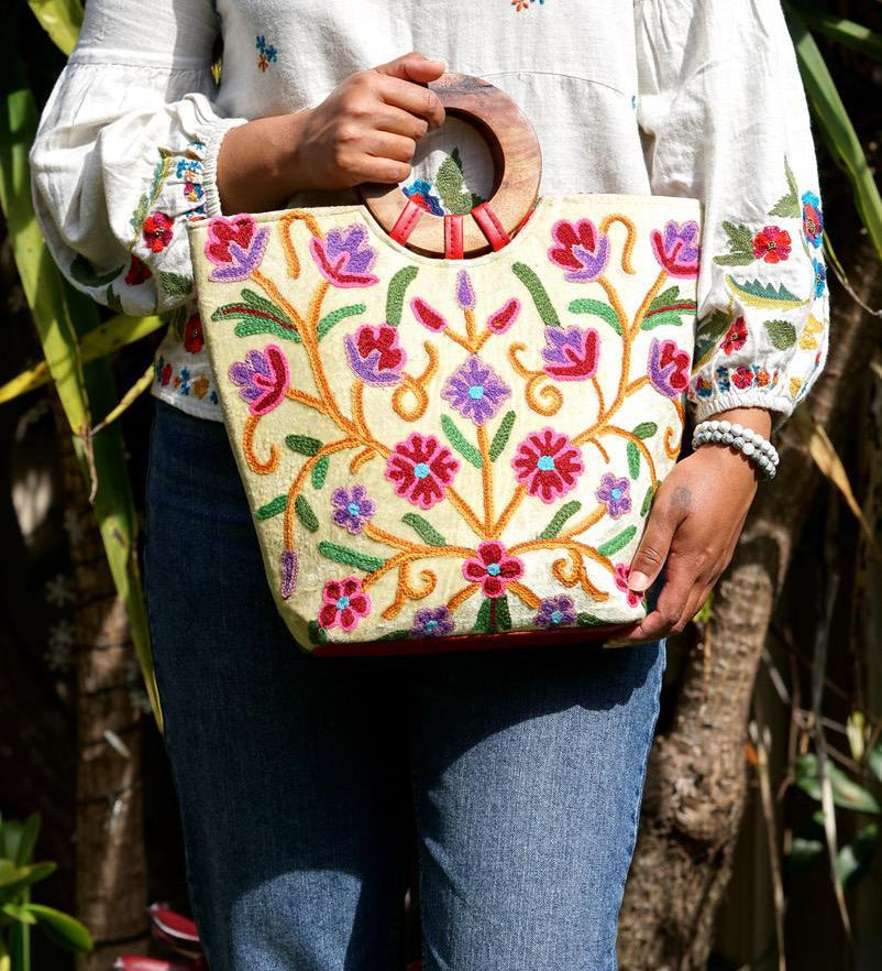 A stylish women's tote bag with floral pattern, crafted ethically from Himalayas.
