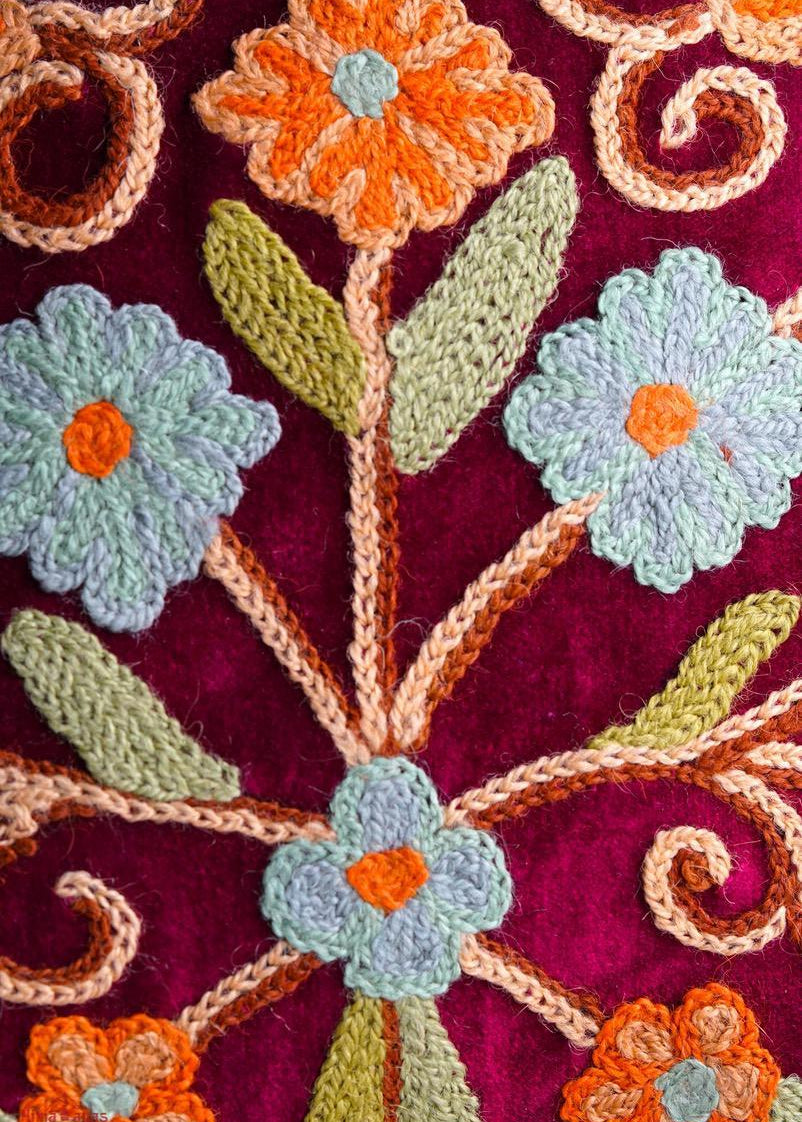 Beautiful hand embroidered tote bag with bright and multi-colour embroidered floral patterns.