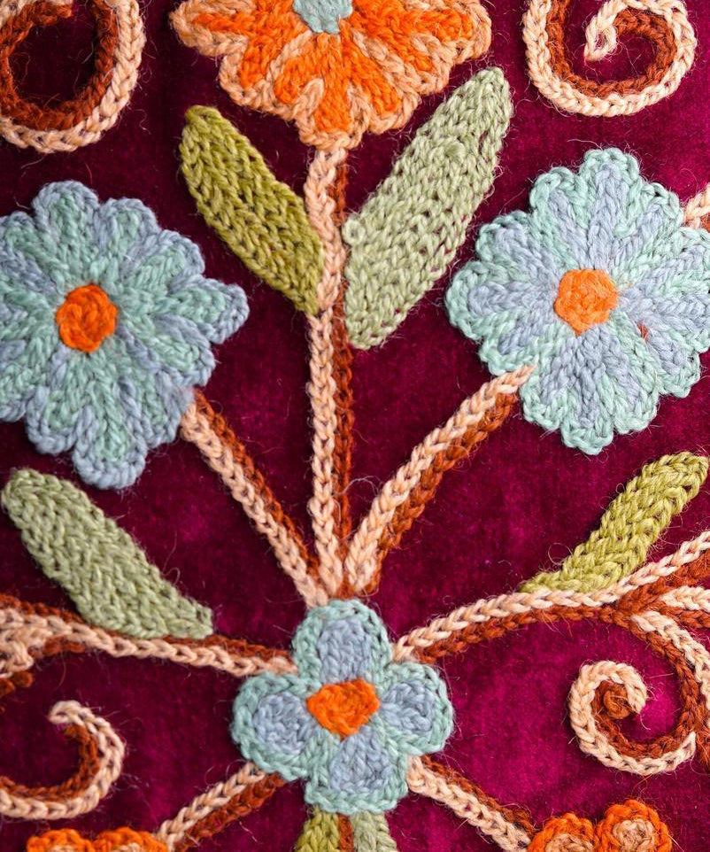 Beautiful hand embroidered tote bag with bright and multi-colour embroidered floral patterns.