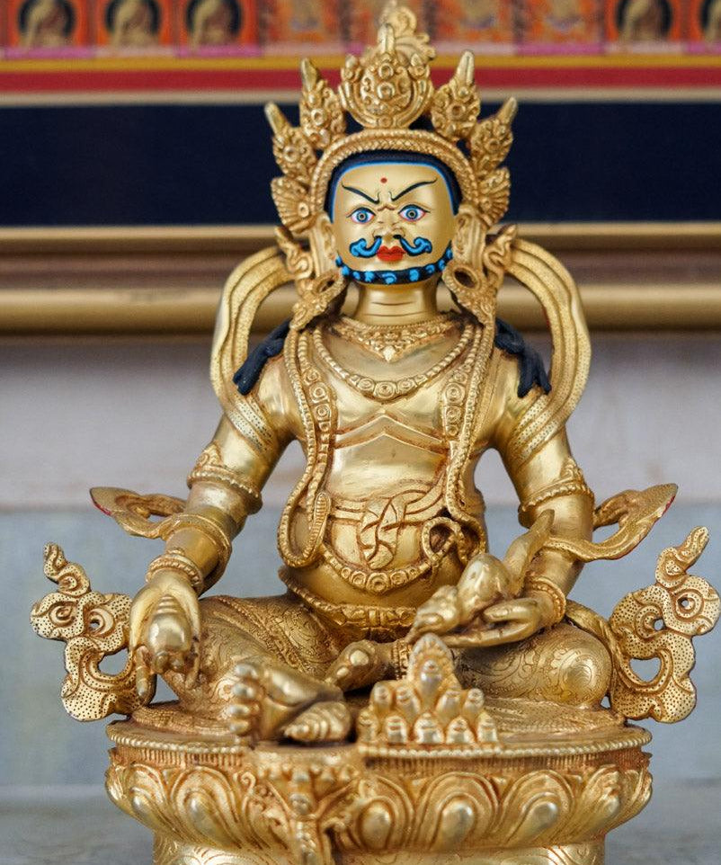Zambala or Jambhala gold plated statue for meditation and altar room.  Handmade high quality statue from Nepal