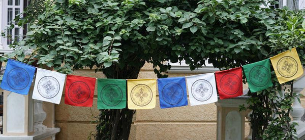 Double Dorje Prayer Flag being hanged