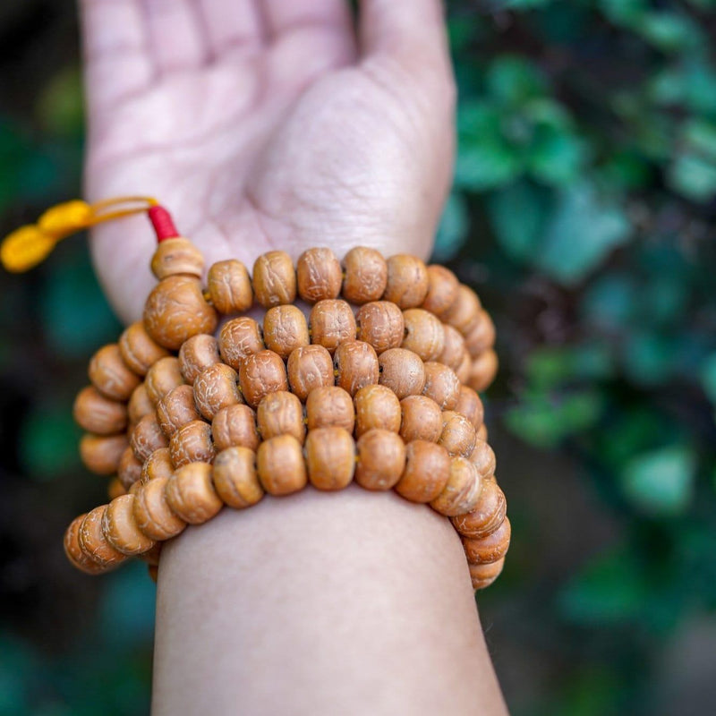 Natural Bodhi Bead Wrist Mala being worn 