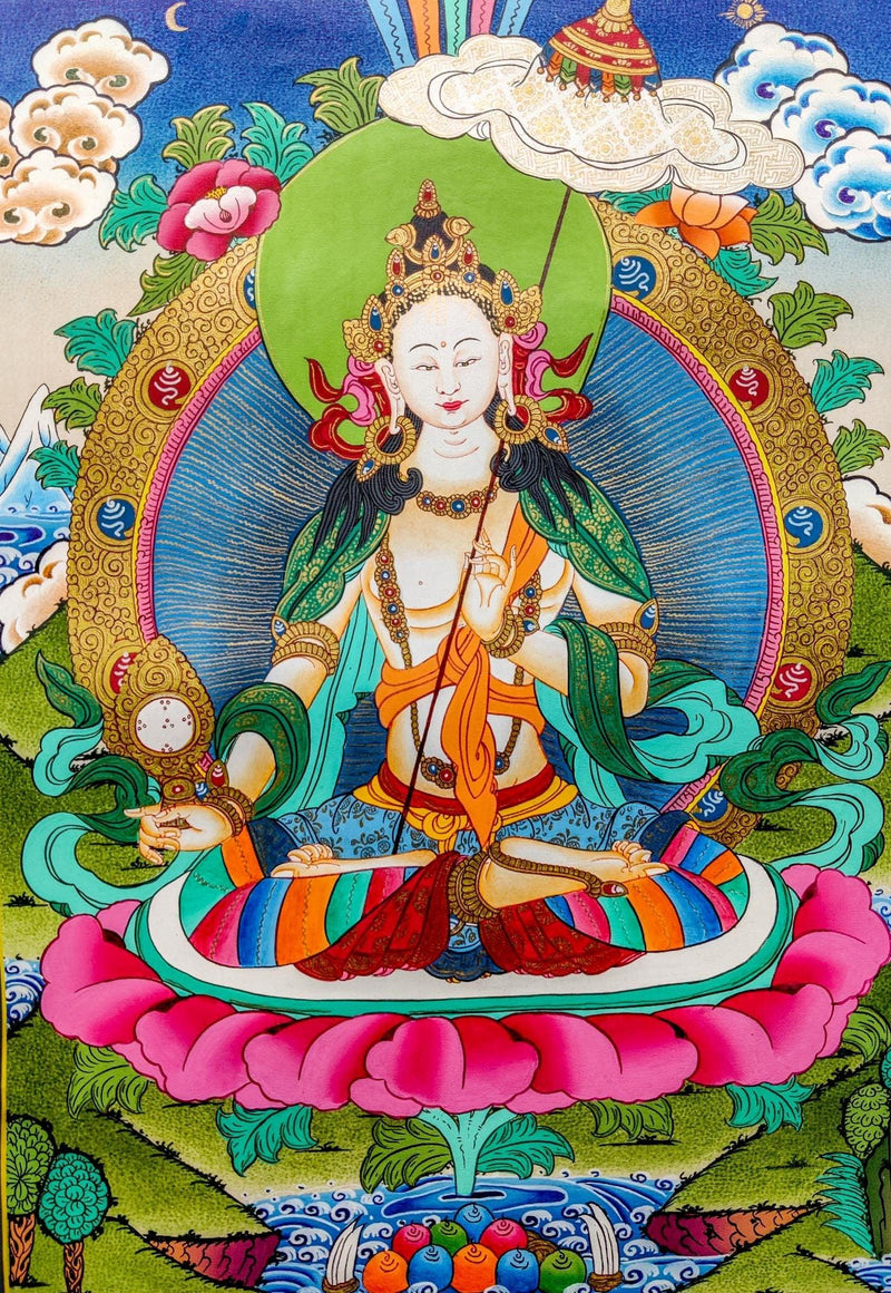 Sitatapatra is brilliant white, radiating with love and compassion and her body is adorned with various ornaments. This beautiful thangka art has portraited the Sitapatra very well.