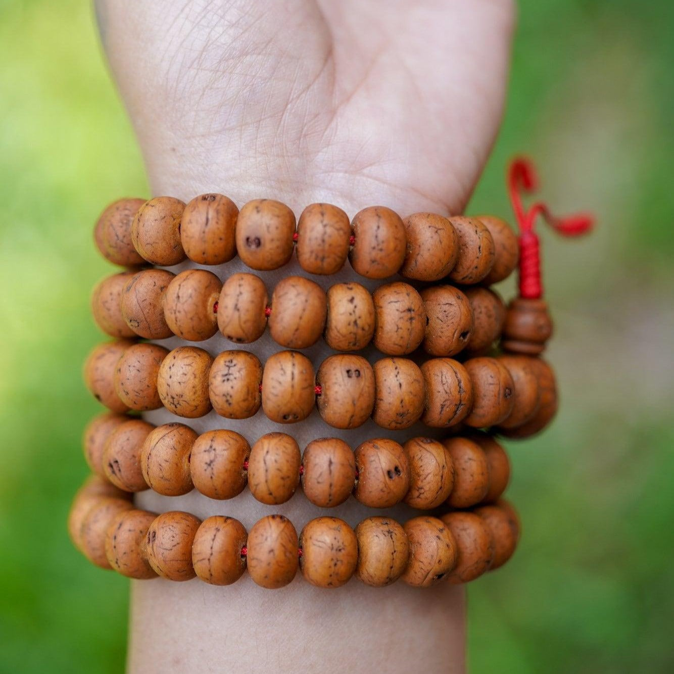 14 mm Bodhi Bead being worn around wrist