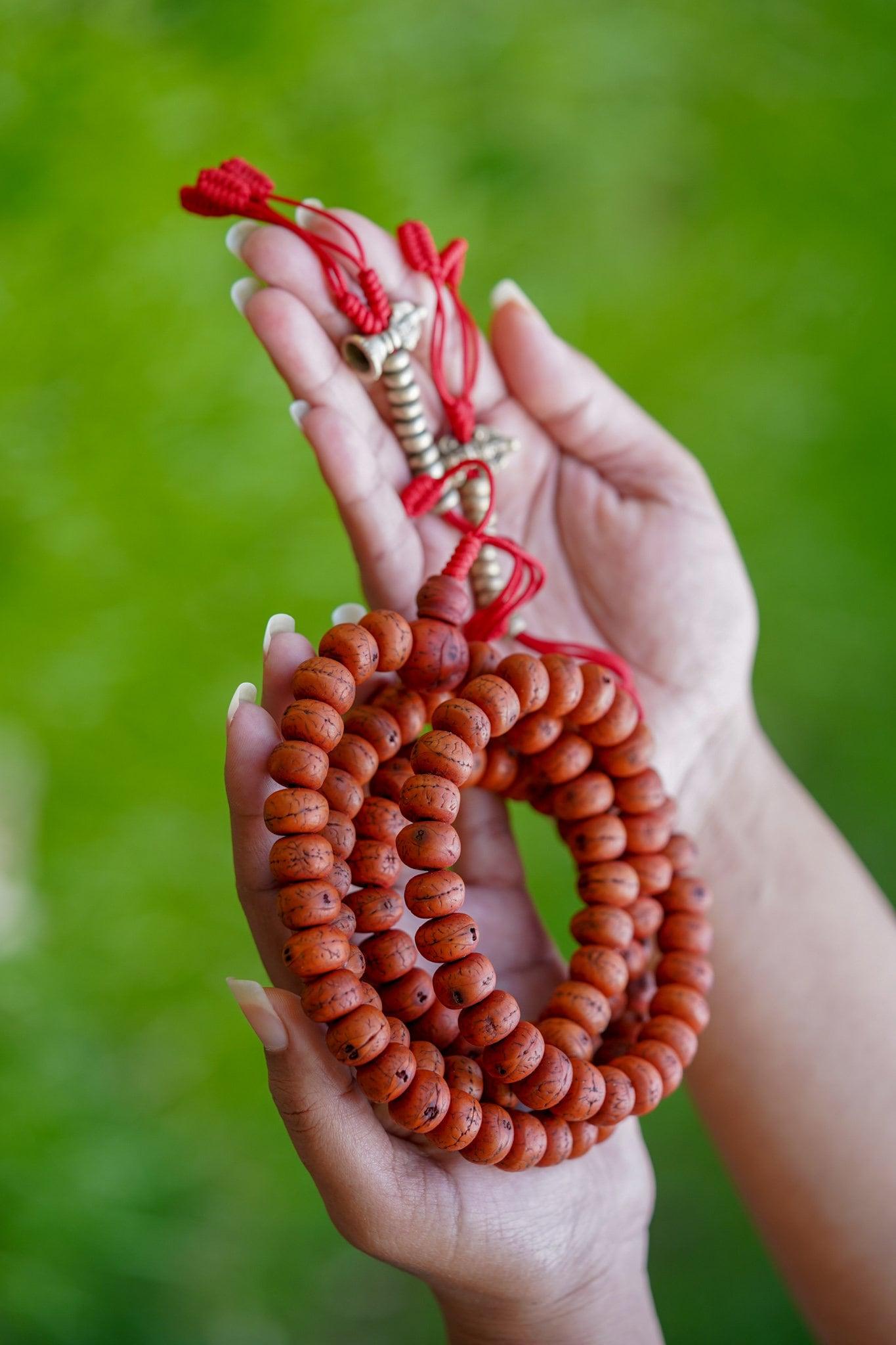 Vajra & Bell Dorje Bodhi Mala being held 