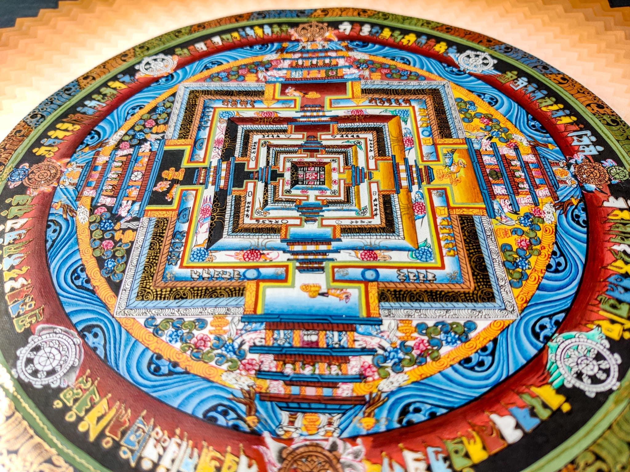 Burlywood color Kalachakra Mandala Thangka painted with gold and natural color.