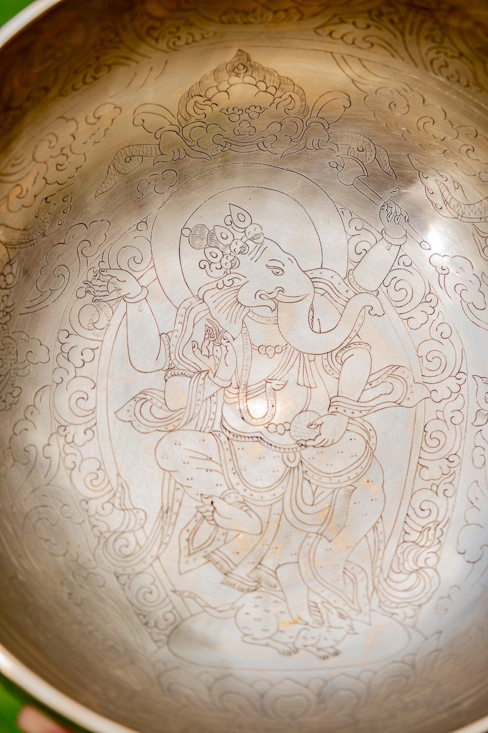 Ganesh 4 arms carving singing bowl  
