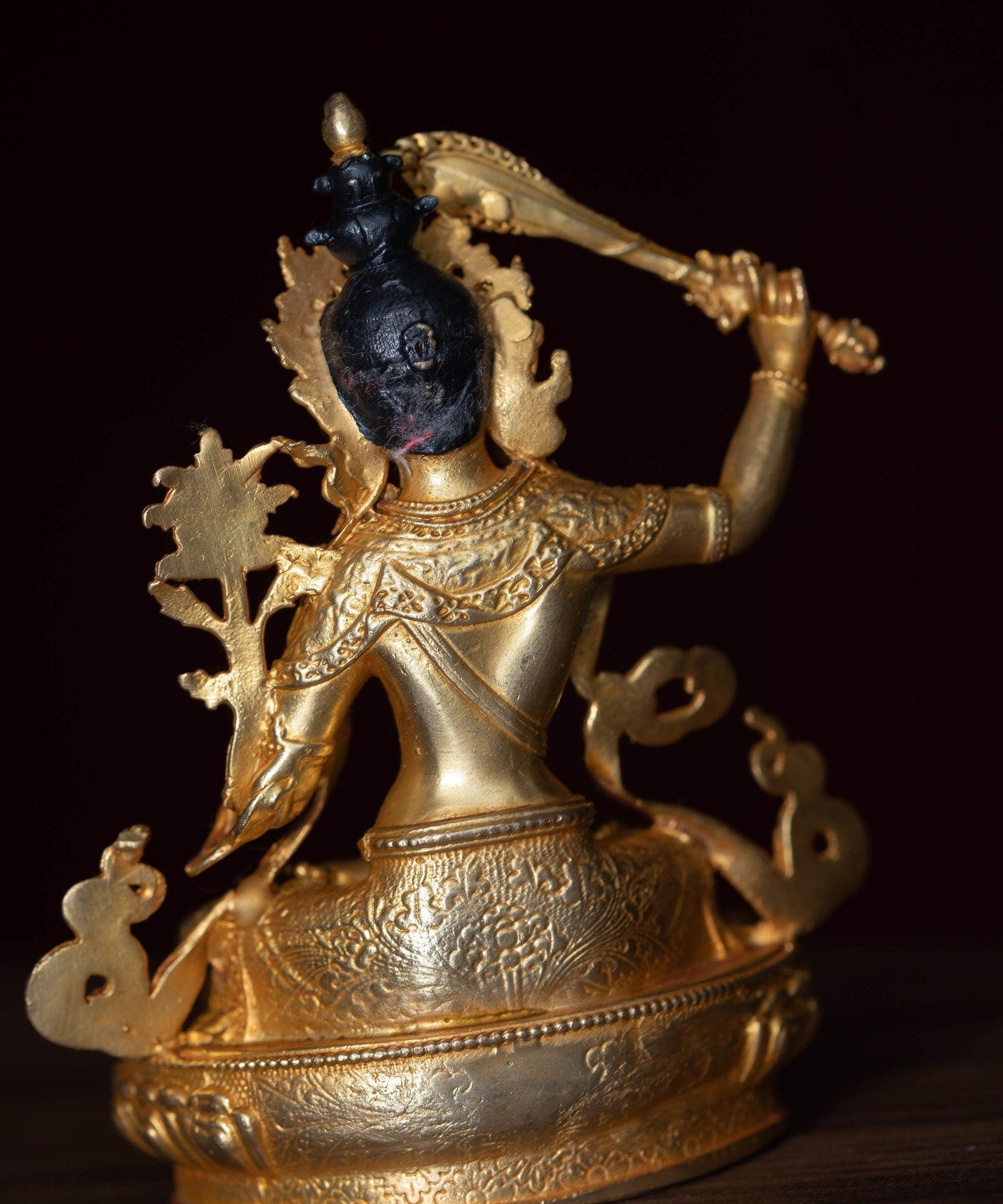 Manjushri Statue gold plated in small size -4 inch.