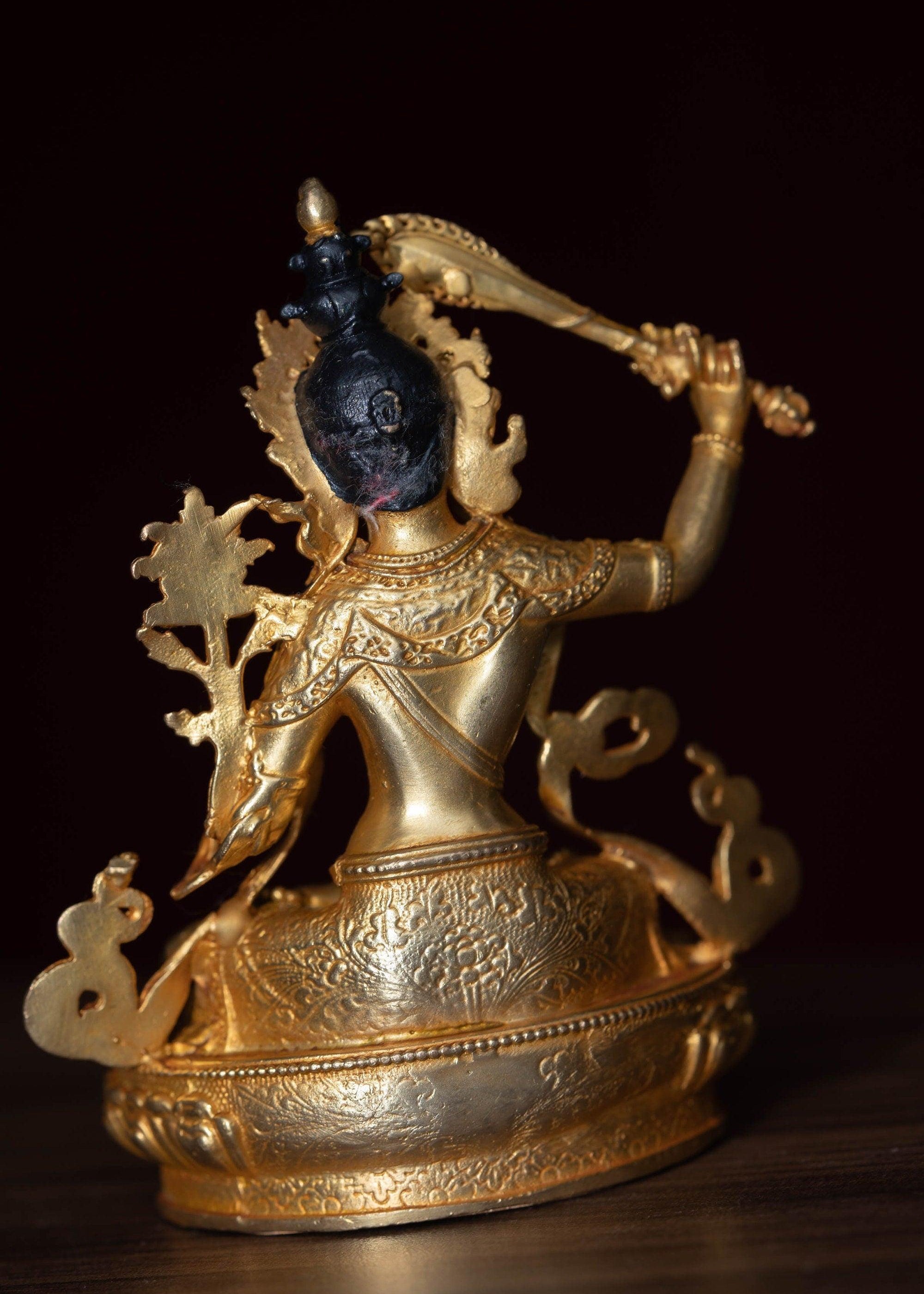 Manjushri Statue gold plated in small size -4 inch.
