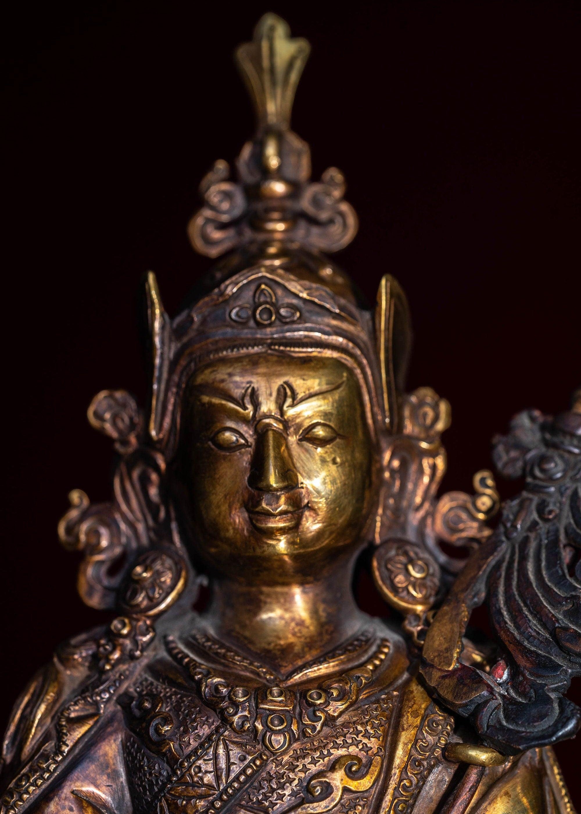 Guru Rinpoche statue metal craft from Nepal . Padmasambhava on lotus with bajra and skull cup