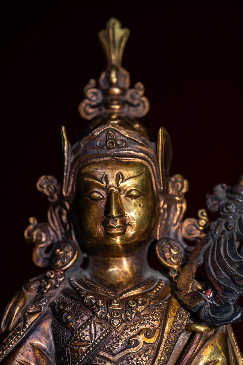 Guru Rinpoche statue metal craft from Nepal . Padmasambhava on lotus with bajra and skull cup