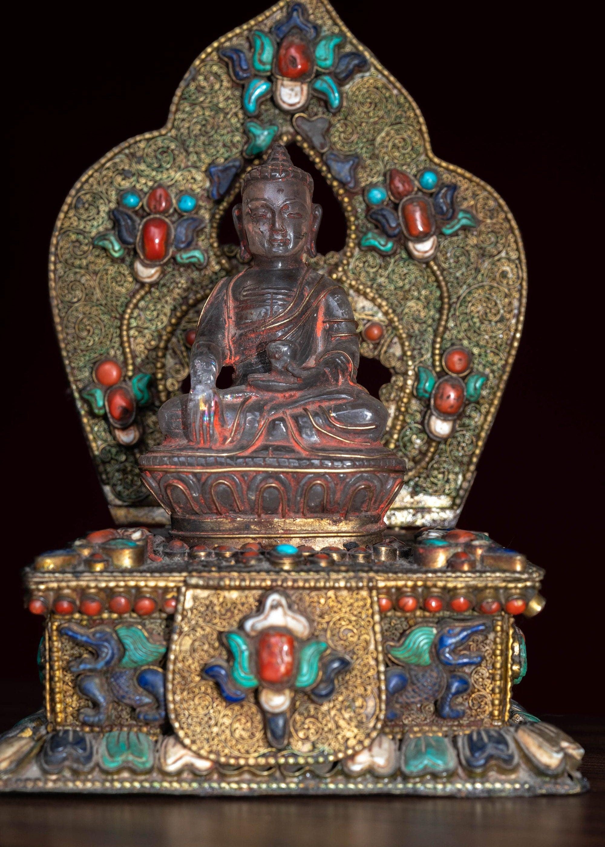 Crystal Statue of Buddha with Metal craft gold plated throne with ruby , turquoise and lapis