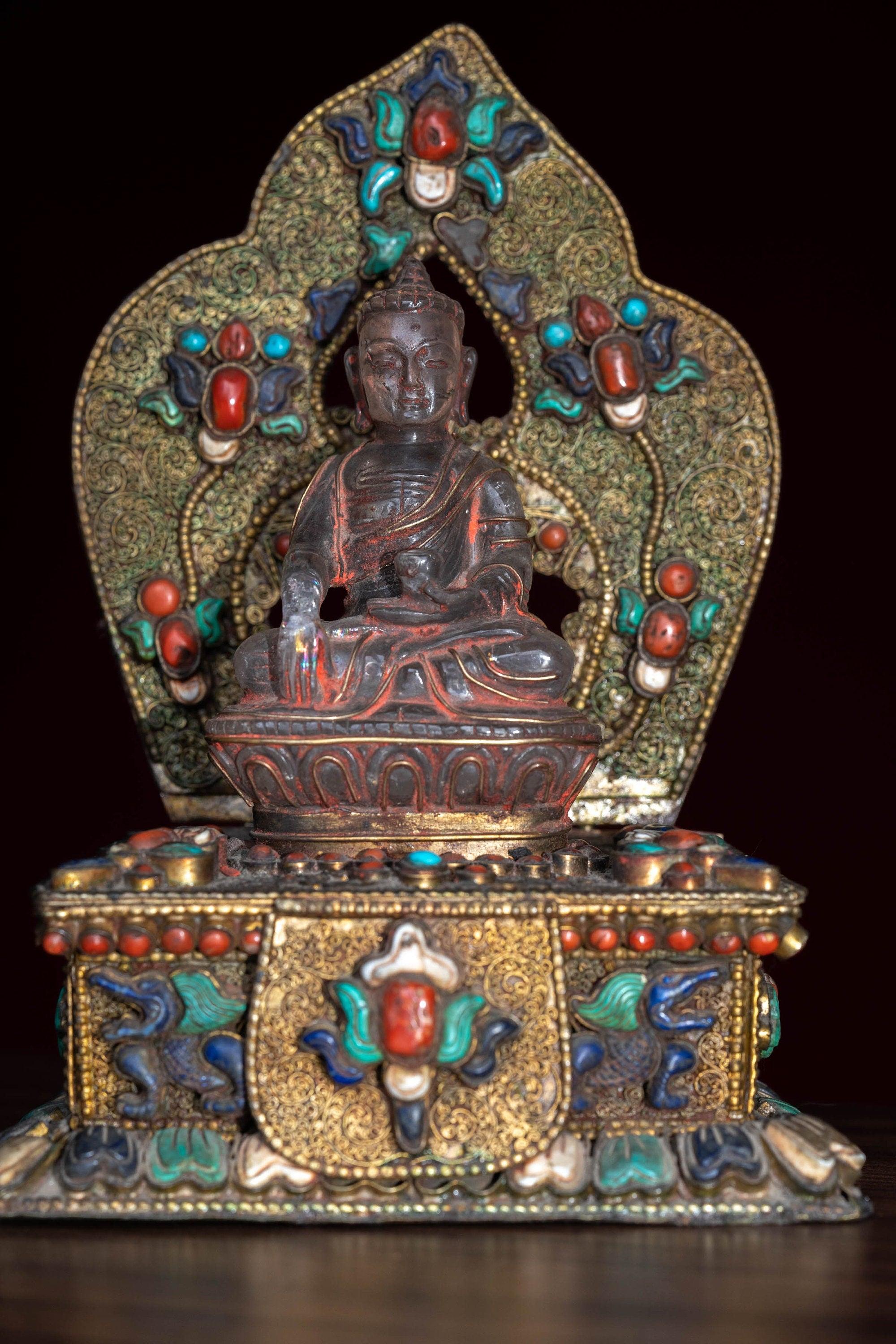 Crystal Statue of Buddha with Metal craft gold plated throne with ruby , turquoise and lapis