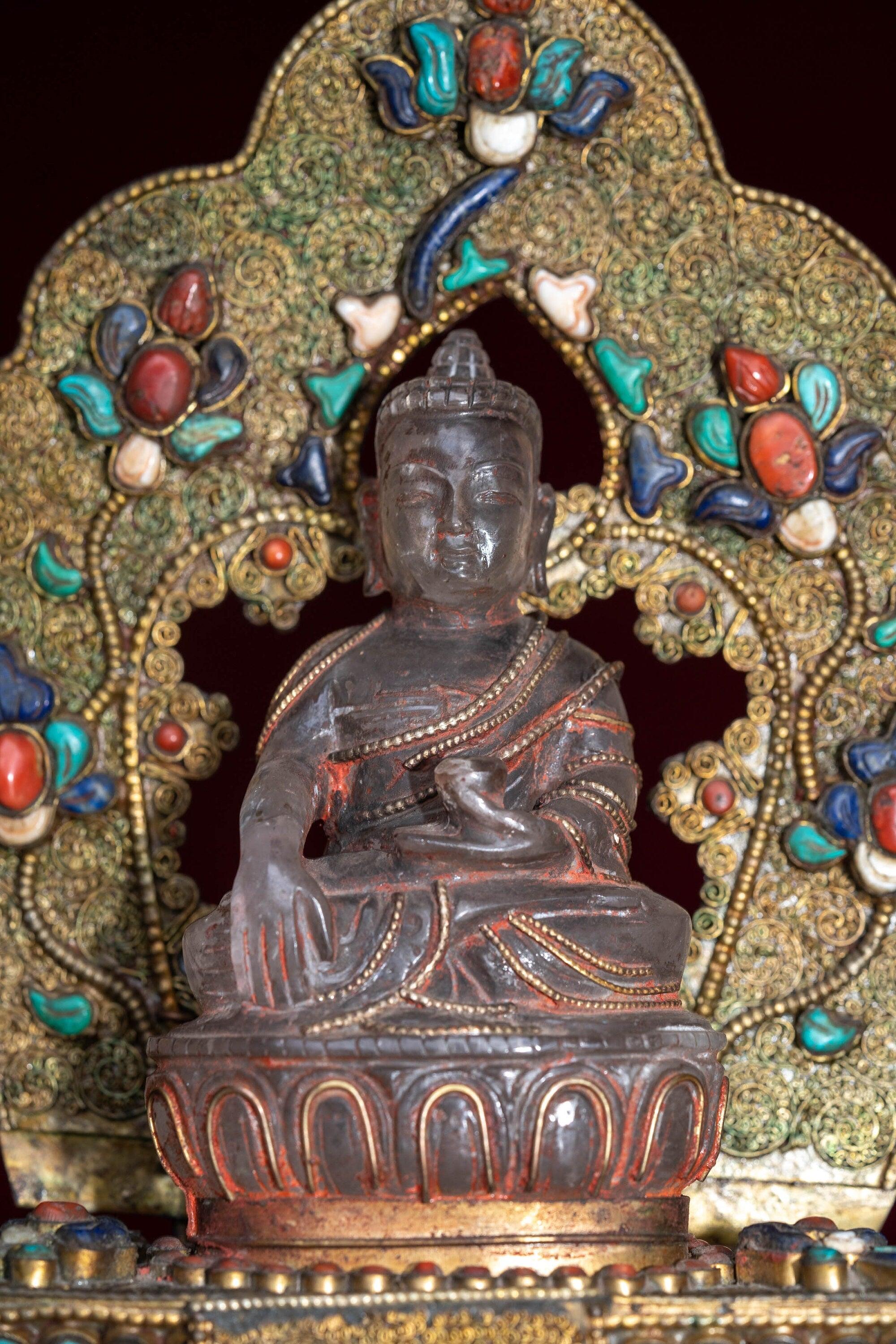 Crystal Statue of Buddha with Metal craft gold plated throne with ruby , turquoise and lapis